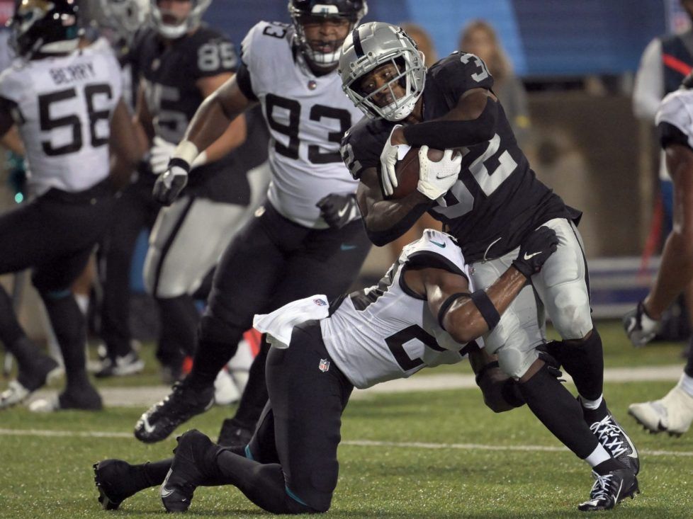 Las Vegas Raiders running back Austin Walter (32) reacts after scoring a  touchdown during an NFL