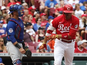 Cincinnati Reds first baseman Joey Votto (19) reacts after flying out against the Chicago Cubs during the sixth inning at Great American Ball Park Aug. 14, 2022.