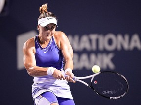 Canadian Bianca Andreescu returns a shot to Alize Cornet on Wednesday night at the National Bank Open at Sobeys Stadium in Toronto.