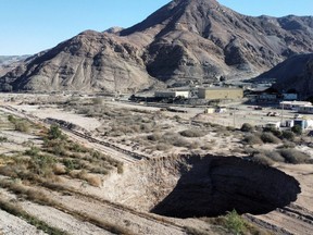 A sinkhole is discovered in a mining area near Tierra Amarilla, in Copiapo, Chile, August 7, 2022.