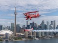 Brent Handy in his Pitts 2 flying in formation with 80 year old Gord Price in his Yak 50 at the 2019 Canadian International Air Show.