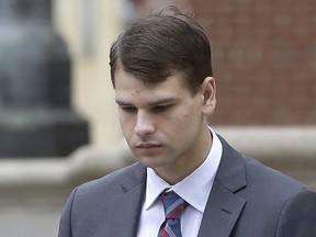 Nathan Carman arrives at federal court in Providence, R.I., Tuesday, Aug. 13, 2019.