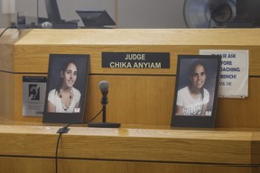 Photos of Sarah and Amina Said are shown during the second day of trial for Yaser Said at the Frank Crowley Courts Building in Dallas, Wednesday, Aug. 3, 2022. (Shafkat Anowar/The Dallas Morning News via AP)
