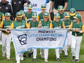 Midwest Region Champion Little League team from Davenport, Iowa, participates in the opening ceremony of the 2022 Little League World Series baseball tournament in South Williamsport, Pa.,on Aug. 17, 2022. Files