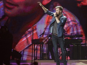 Charles Kelley of Lady A performs at Rexall Place in Edmonton on Friday, March 7, 2014.