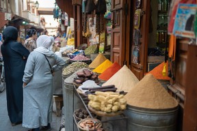 Streets lined with bags of colourful spices in the medina in Marrakech. Photo by Mirko Freund.