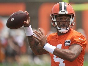 Cleveland Browns quarterback Deshaun Watson throws a pass during training camp. The NFL is hoping the hiring of a new lawyer will help extract the proper amount of punishment for Watson.