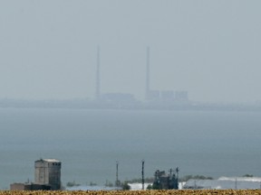 This photograph taken on Aug. 13, 2022 from Vyschetarasivka shows the Zaporizhzhia nuclear power plant across the Dnipro River.