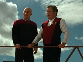 Patrick Stewart and William Shatner in a scene from Star Trek Generations.