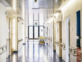 Hospital with corridor and bed without.