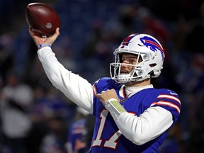 Josh Allen  of the Buffalo Bills warms up prior to the AFC Wild Card playoff game against the New England Patriots at Highmark Stadium on January 15, 2022 in Buffalo, New York.