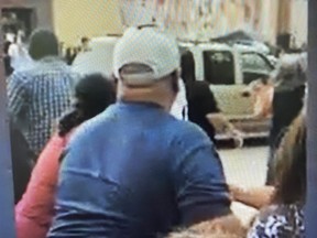 A screengrab from video of an SUV plowing through a parade in Gallup, N.M. on Aug. 4, 2022.