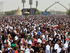 Supporters of Iraqi populist leader Moqtada al-Sadr gather for mass Friday prayer at Grand Festivities Square within the Green Zone, in Baghdad August 5, 2022.