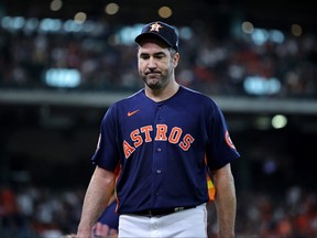 Houston Astros starting pitcher Justin Verlander walks to the dugout after retiring the side against the Baltimore Orioles during the third inning at Minute Maid Park in Houston, Aug. 28, 2022.