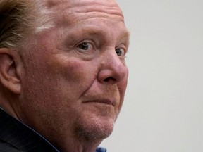 Celebrity chef Mario Batali listens during the first day of his trial on a criminal charge that he forcibly groped and kissed a woman at a restaurant in 2017, at the Boston Municipal Court in Boston, May 9, 2022.
