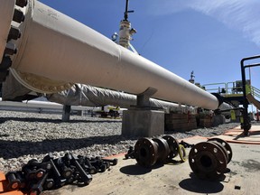 In this June 8, 2017, file photo, fresh nuts, bolts and fittings are ready to be added to the east leg of the Enbridge Line 5 pipeline near St. Ignace, Mich.