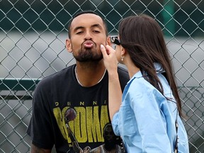 Australia's Nick Kyrgios with his girlfriend Costeen Hatzi during Wimbledon practice at the All England Lawn Tennis and Croquet Club in London, July 6, 2022.