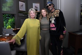 Martha Stewart with Ellen Pompeo and Snoop Dogg at the opening of the Bedford by Martha Stewart restaurant in Las Vegas - Photo by Dennis Trarcello/Getty Images for Caesars Entertainment