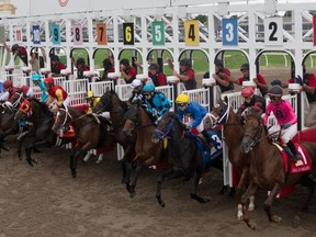 Horses break out of the gate at the Queen’s Plate at Woodbine Racetrack yesterday. Moira (No. 8) captured the win.  Michael Burns Photo