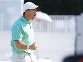 Rory McIlroy of Northern Ireland reacts to his birdie on the 15th green during the final round of the Tour Championship at East Lake Golf Club on Aug. 28, 2022 in Atlanta, Ga.