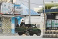 Somali security officers are seen at a section of Hotel Hayat, the scene of an al Qaeda-linked al Shabaab group militant attack in Mogadishu, Somalia Aug. 20, 2022.