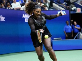 Serena Williams hits to Danka Kovinic during the 2022 U.S. Open tennis tournament at USTA Billie Jean King National Tennis Center in Flushing, N.Y., Monday, Aug. 29, 2022.