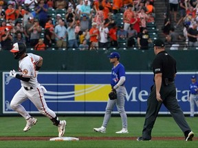 Ramon Urias of the Baltimore Orioles  rounds the bases after hitting a three-run home run in the first inning against the Toronto Blue Jays at Oriole Park at Camden Yards on Aug. 8, 2022.