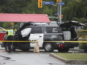 Toronto Police investigate after a Police Dog Service supervisor's SUV - with two dogs in the rear of it was stolen by a suspect at a retail break-and-enter at Yonge St. and Lawrence Ave. at 4:20 a.m. The suspect fled in the vehicle crashing it 12.5 kms west at Keefe St. and Lawrence Ave. West. on Monday August 8, 2022.