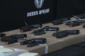 York Regional Police display guns and drugs seized during Project Monarch. JACK BOLAND/TORONTO SUN