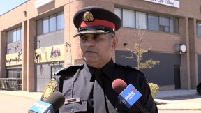 Peel Regional Police Insp. Raj Biring speaks to reporters outside HER adult entertainment club at1325 Eglinton Avenue East, Mississauga at Dixie Rd. on Friday, Aug. 12, 2022. JACK BOLAND/TORONTO SUN