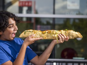 Mateo Aguilar, 11, about to tackle the Two-Foot-Long Taco at The Ex.