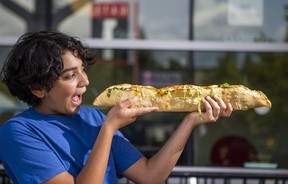 Mateo Aguilar, 11, about to tackle the Two-Foot-Long Taco at The Ex. (Ernest Doroszuk/Toronto Sun)