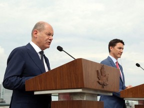 Prime Minister Justin Trudeau (right) and German Chancellor Olaf Scholz participate in a news conference in Montreal, Monday, Aug. 22, 2022.