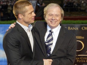 German director Wolfgang Petersen and actor Brad Pitt arrive to the Europe premiere of their movie "Troy" at the Kono Cinestar cinema in Berlin on May 9, 2004.