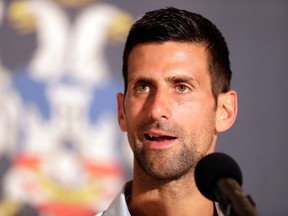 In this file photo taken on July 11, 2022 Serbia's Novak Djokovic speaks during press conference after attending his welcoming ceremony celebration at the Belgrade City Hall in Belgrade.