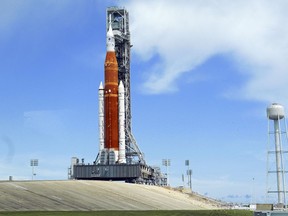 The Artemis 1 rocket stands ready for launch on Pad 39B at the Kennedy Space Center, Thursday, Aug. 25, 2022, in Cape Canaveral, Fla.