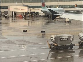 A passenger took a photo of two pieces of luggage on a tarmac at Pearson International Airport on Monday