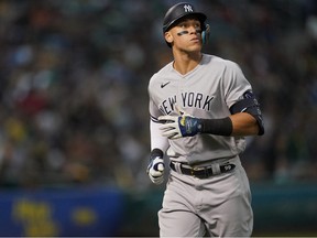 New York Yankees center fielder Aaron Judge looks out to the outfield after flying to right field against the Oakland Athletics in the seventh inning at RingCentral Coliseum.
