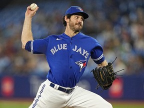 Aug 30, 2022; Toronto, Ontario, CAN; Toronto Blue Jays relief pitcher Jordan Romano (68) throws a pitch against the Chicago Cubs during the ninth inning at Rogers Centre.