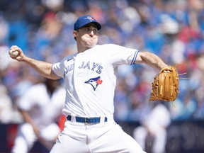 Aug 28, 2022; Toronto, Ontario, CAN; Toronto Blue Jays starting pitcher Ross Stripling (48) throws a pitch against the Los Angeles Angels during the first inning at Rogers Centre.