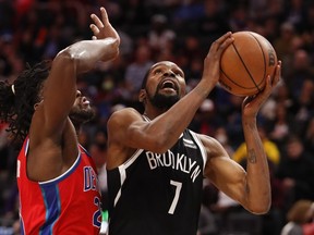 Brooklyn Nets forward Kevin Durant goes up for a shot against Detroit Pistons center Isaiah Stewart during the fourth quarter at Little Caesars Arena.