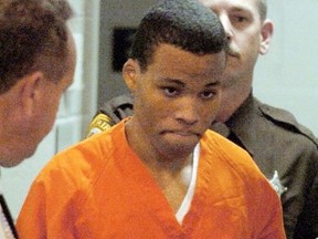 In a Tuesday, Oct.26, 2004 photo, convicted sniper Lee Boyd Malvo enters a courtroom in the Spotsylvania Circuit Court in Spotsylvania, Va.