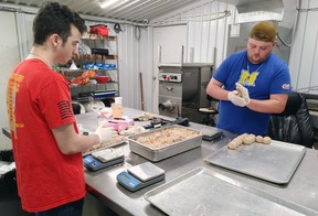 Employees make boudin balls at Insane Sausages in Vinton, La. (Dave Pollard/Toronto Sun)