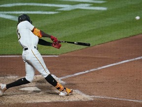 Pittsburgh Pirates' Oneil Cruz hits a two-run home run against the Milwaukee Brewers during the seventh inning of a baseball game Wednesday, Aug. 3, 2022, in Pittsburgh.