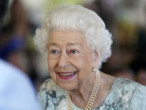 Queen Elizabeth II looks on during a visit to officially open the new building at Thames Hospice, Maidenhead, England July 15, 2022.