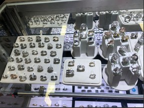 This undated photo provided by the FBI shows a jewelry showcase displaying some of the jewelry that was taken during a robbery.