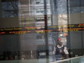 A Toronto Stock Exchange (TSX) ticker is seen in the financial district of Toronto, Ontario, Canada, on Monday, March 16, 2020.