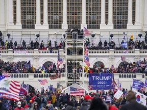 Insurrectionists loyal to President Donald Trump breach the Capitol in Washington, D.C., Jan. 6, 2021.