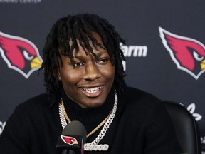 Arizona Cardinals new wide receiver Marquise Brown answers a question during a news conference at the NFL football team training facility on April 29, 2022, in Tempe, Ariz.