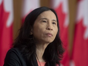 Chief Public Health Officer Theresa Tam listens to a question during a news conference, Tuesday, January 12, 2021 in Ottawa. Dr. Theresa Tam says Canada's public health agency is looking to make the most of Canada's waste, and plans to sift through the sewage to test for and measure new health threats like monkeypox, polio, antimicrobial resistant organism and more.